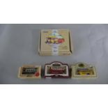 A boxed set of Corgi 'The Buses of Yellow Way' along with three boxed tin plate bus models,