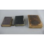 Three Victorian embossed leather photo albums, two with brass locks. H.22 W.18cm (largest)