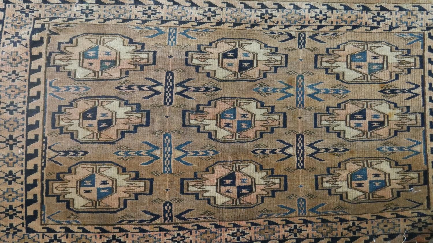 A tan ground fine handmade Turkman saddle bag. L.113 W.73cm - Image 2 of 7
