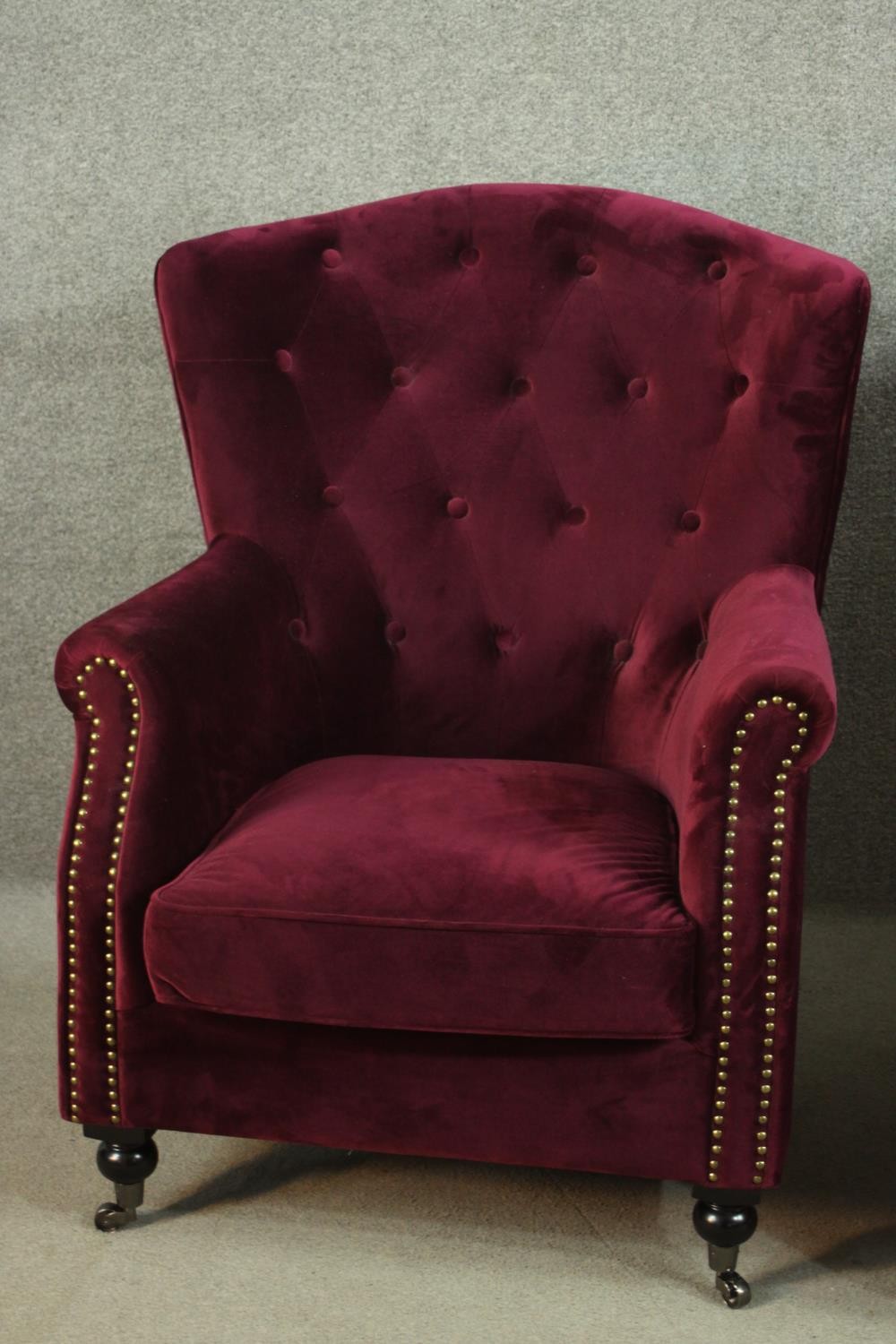 A pair of Victorian style wingback armchairs, upholstered in purple velour, with a buttoned back, - Image 3 of 9