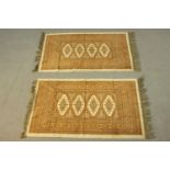 Two small Bokhara motif rugs. L.110 W.68cm.