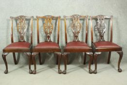 A set of five Chippendale style mahogany dining chairs including one carver and four side chairs,