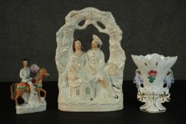 A collection of ceramics, including two 19th century Staffordshire flatback figures, one of a