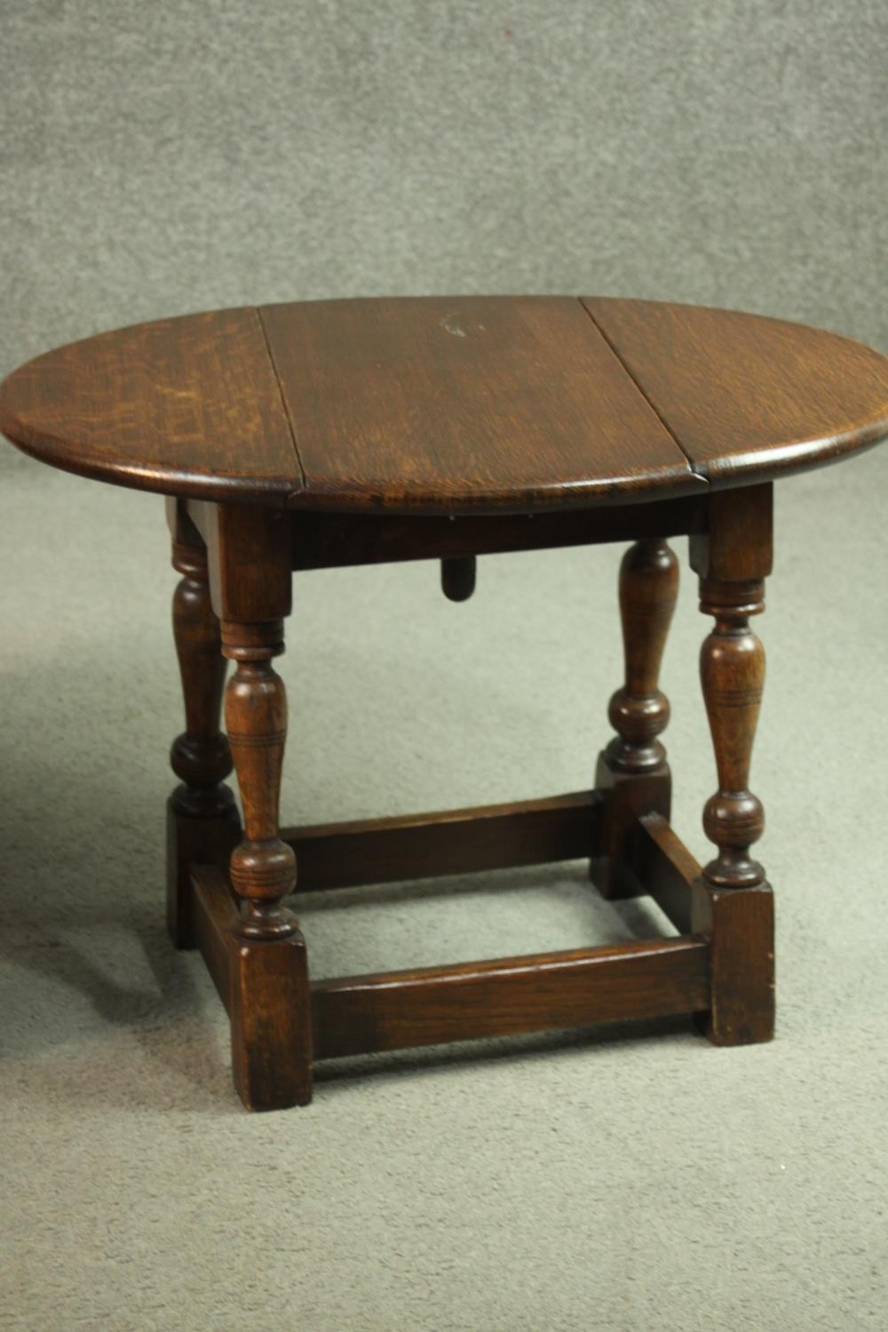 A 1930's figured walnut coffee table, with a circular pie crust top on cabriole legs, together - Image 6 of 7