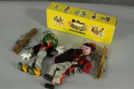 Two vintage Pelham puppets, one of Jiminy Cricket, one of a soldier, one with box.