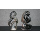 Two African carved hardstone sculptures, one of two stylised figures and the other of a pair of