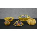 A collection of five early 20th century French Sarreguemines majolica ceramic fruit design jam pots,