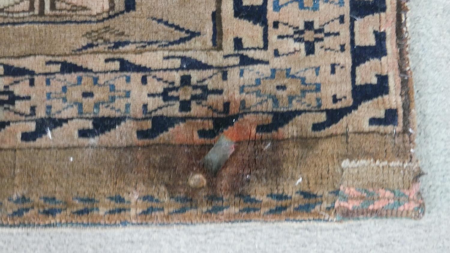 A tan ground fine handmade Turkman saddle bag. L.113 W.73cm - Image 4 of 7