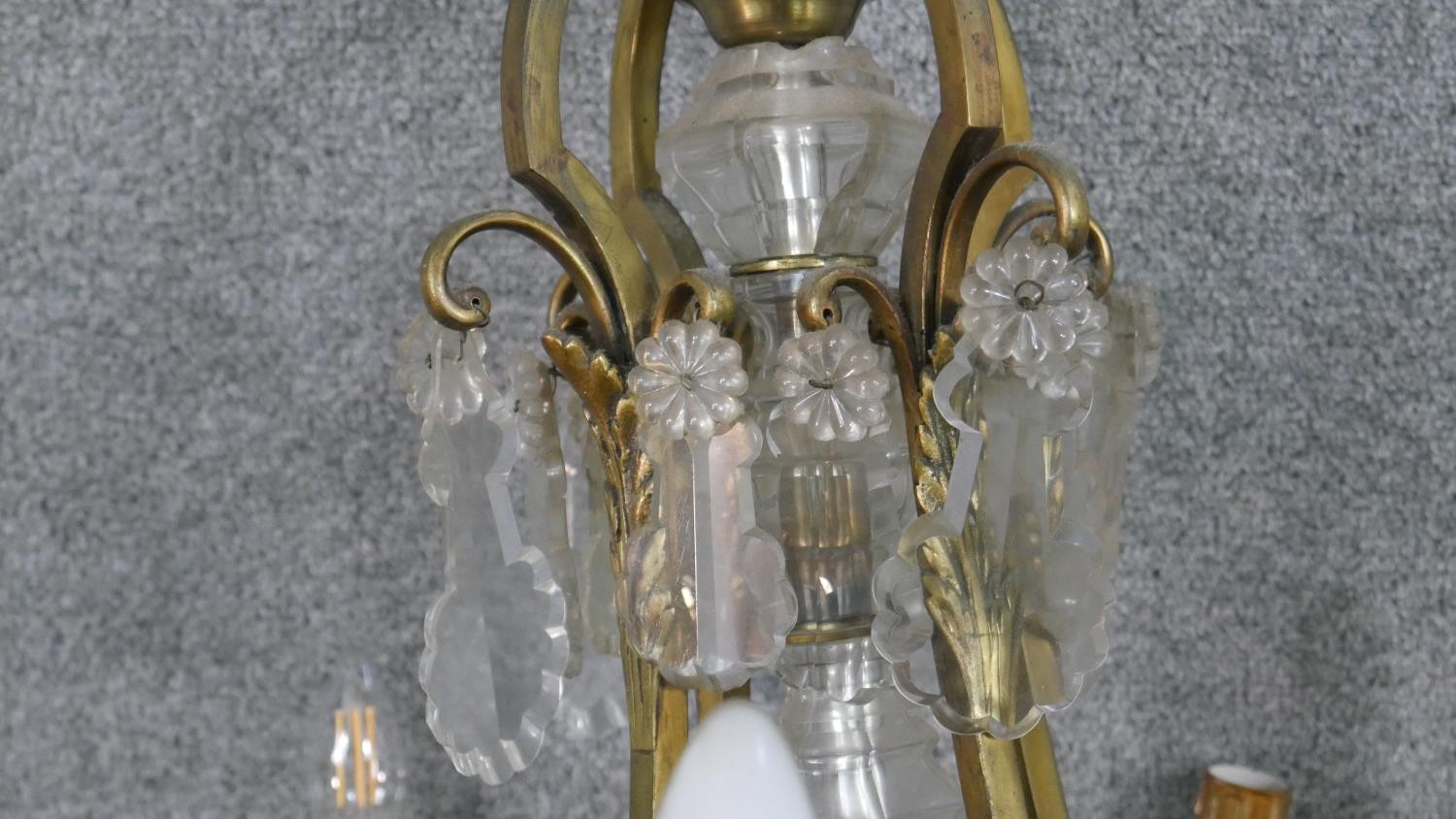 A scrolling gilt brass and crystal eight branch chandelier with hanging crystal drops and foliate - Image 5 of 11