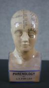A ceramic phrenology head by L.N. Fowler. H.29 W.13 D.9cm