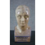 A ceramic phrenology head by L.N. Fowler. H.29 W.13 D.9cm