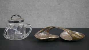 A Victorian silver plated three handled blown glass lidded biscuit barrel along with a Christoffel