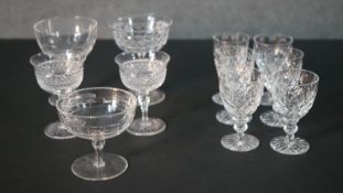 A collection of eleven 19th and early 20th century cut crystal sherry and champagne coupes, some