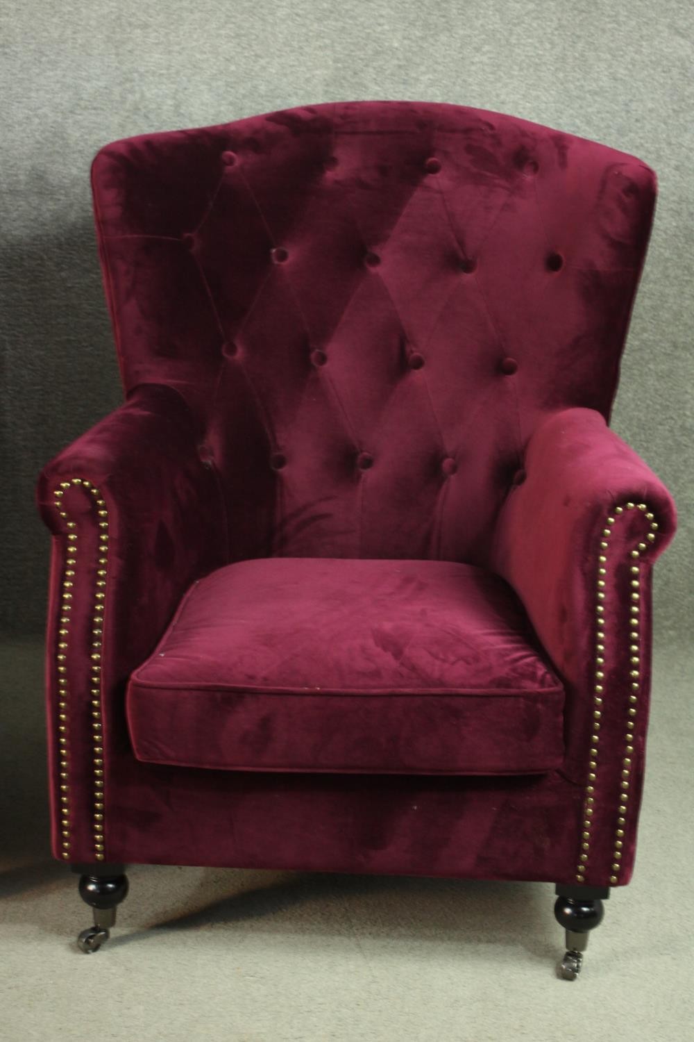 A pair of Victorian style wingback armchairs, upholstered in purple velour, with a buttoned back, - Image 2 of 9
