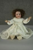 A German Armand Marseille doll, Numbered 390, 19th century porcelain bisque head doll with glass