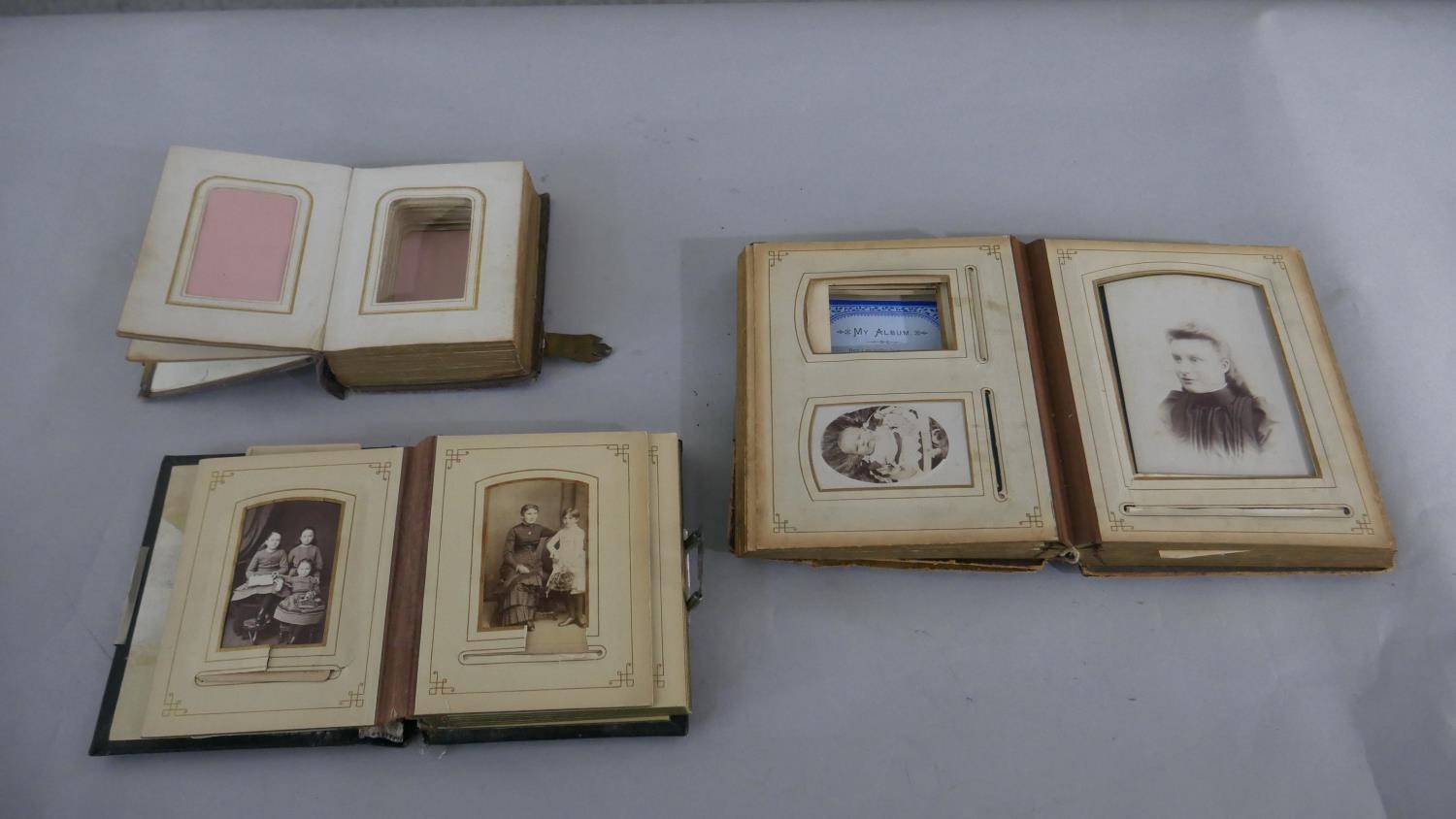 Three Victorian embossed leather photo albums, two with brass locks. H.22 W.18cm (largest) - Image 2 of 5