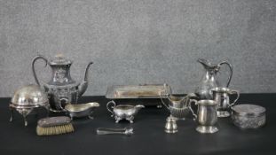 A collection of silver and silver plate, including a silver backed clothes brush, silver plated tray