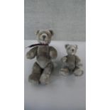 Two 20th century grey mohair jointed teddy bears, with suede pads. H.43 W.23cm (largest)