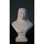 A composite marble bust of Queen Victoria, with engraved name. H.14.5 W.10 D.7cm