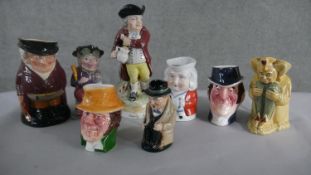 Eight early 20th century hand painted ceramic Toby jugs, various characters and makers. H.28 W.