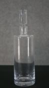 A Kelly Hoppen crystal cylindrical decanter with stopper. Label to base. H.31 Diam.9cm