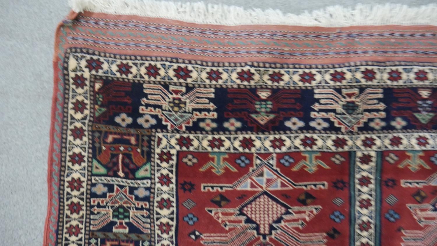 A Persian Kurdish rust ground hand made rug. L.200 W.115cm. - Image 4 of 5