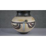 A large studio pottery Native American inspired design vase, impressed mark to the base. H.26 W.26cm