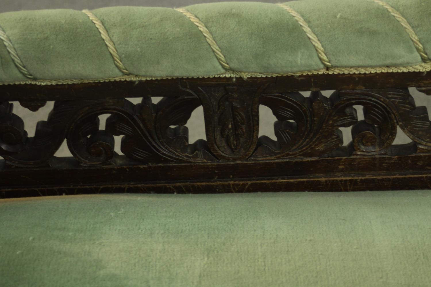 An Edwardian chaise longue, upholstered in green buttoned velour, the back panel carved and - Image 6 of 8