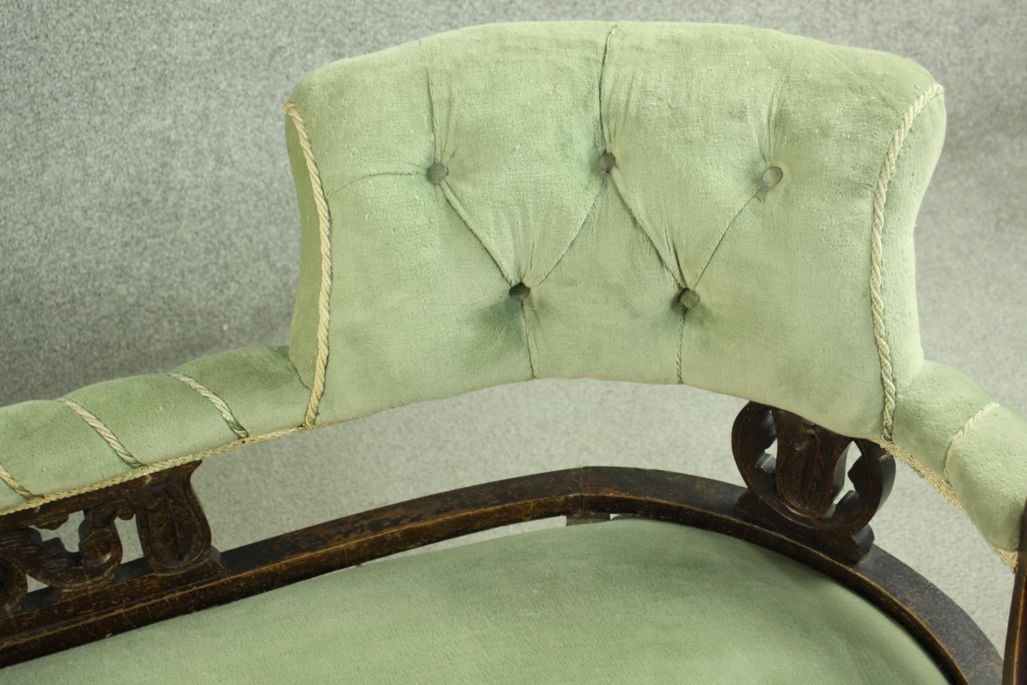 An Edwardian chaise longue, upholstered in green buttoned velour, the back panel carved and - Image 3 of 8