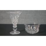 A mid-19th century cut glass wine glass rinser with a cut crystal trumpet shaped vase and star cut