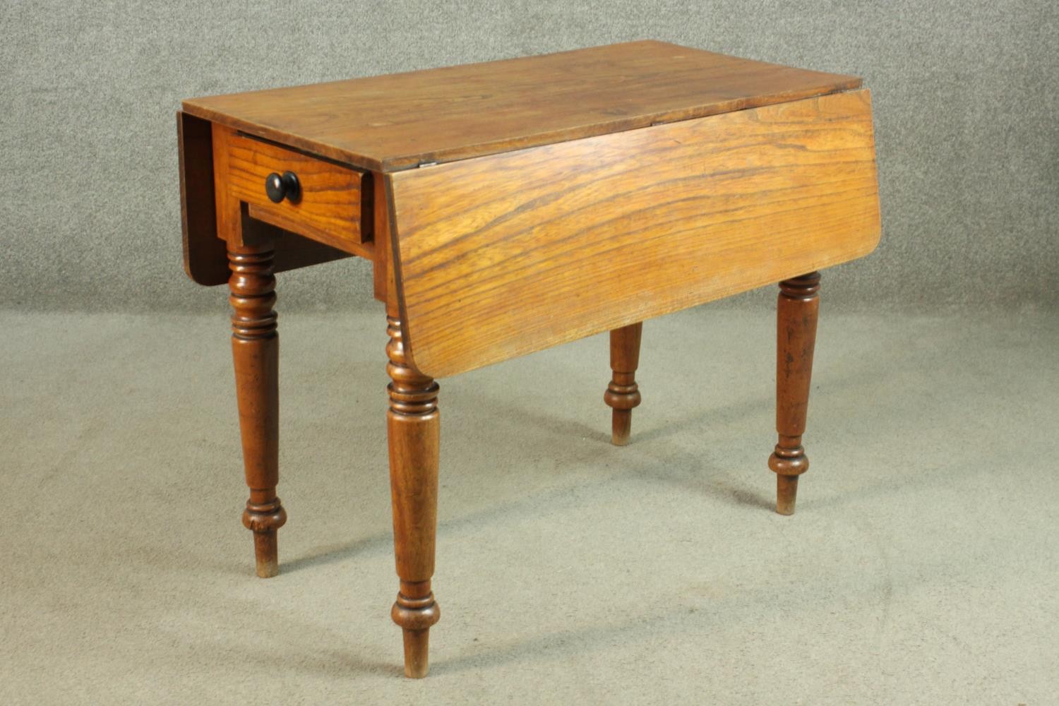 A Victorian Pembroke table, with drop leaves over an end drawer, on turned legs. H.70 W.44 D. - Image 2 of 7