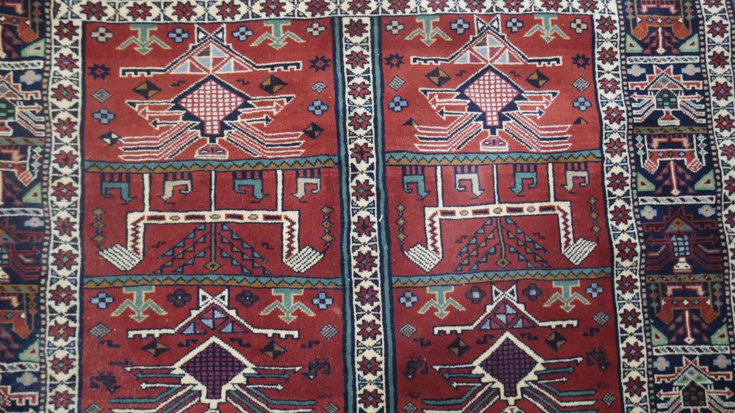 A Persian Kurdish rust ground hand made rug. L.200 W.115cm. - Image 3 of 5