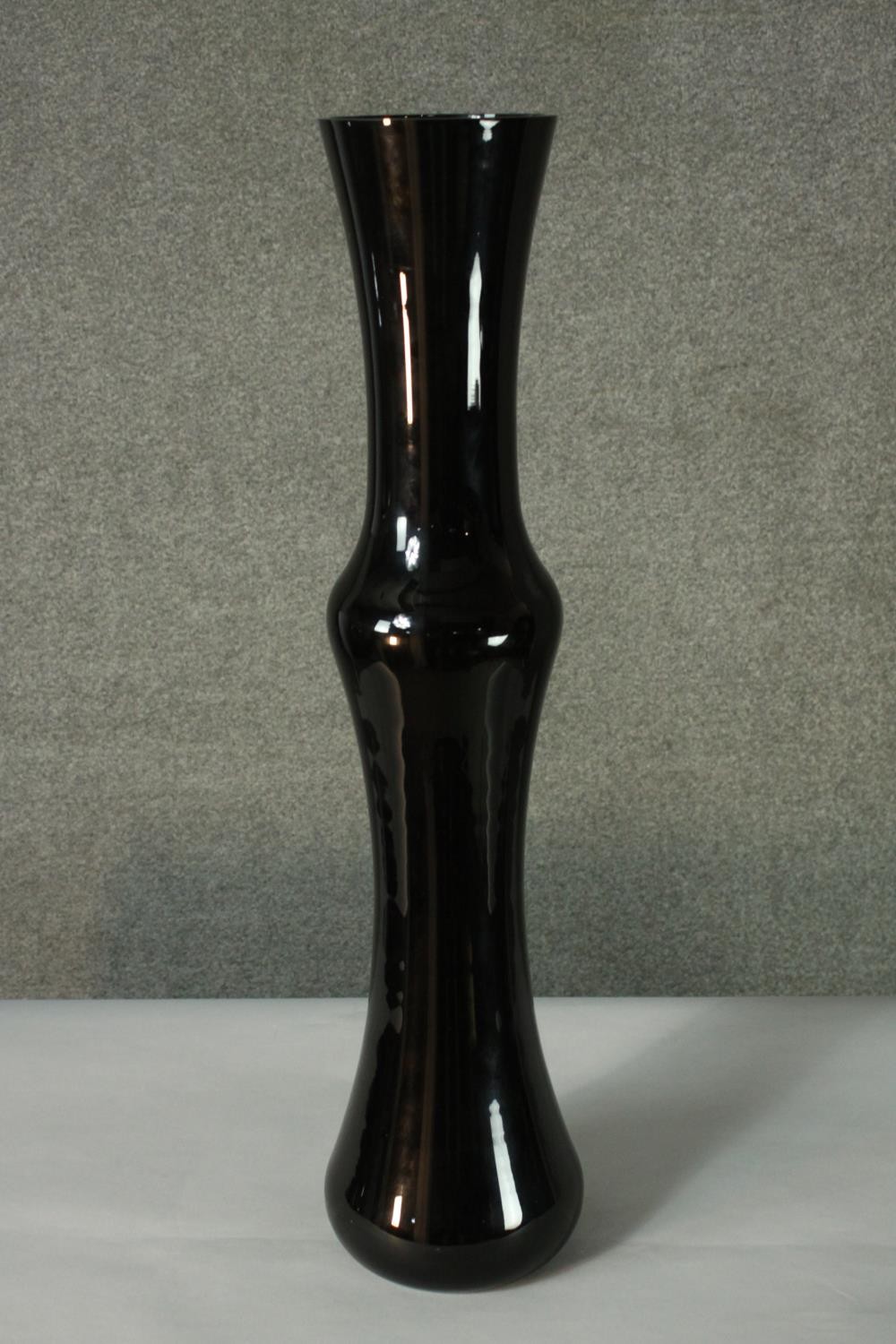 A large contemporary black art glass vase. H.80cm.