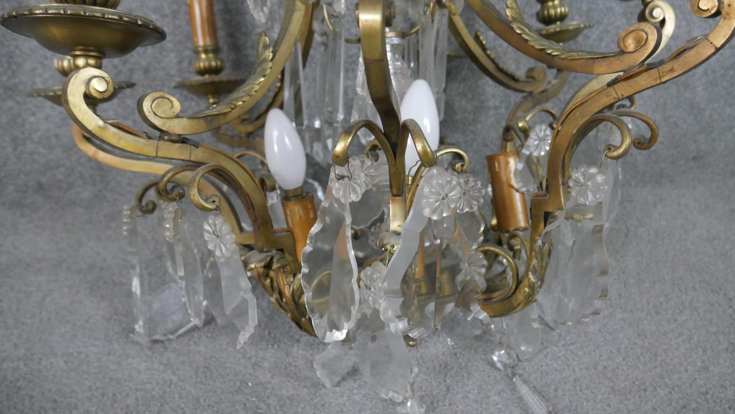 A scrolling gilt brass and crystal eight branch chandelier with hanging crystal drops and foliate - Image 8 of 11