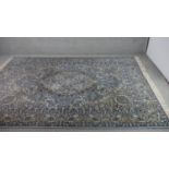 A blue ground Keshan motif carpet. L.290 W.200cm