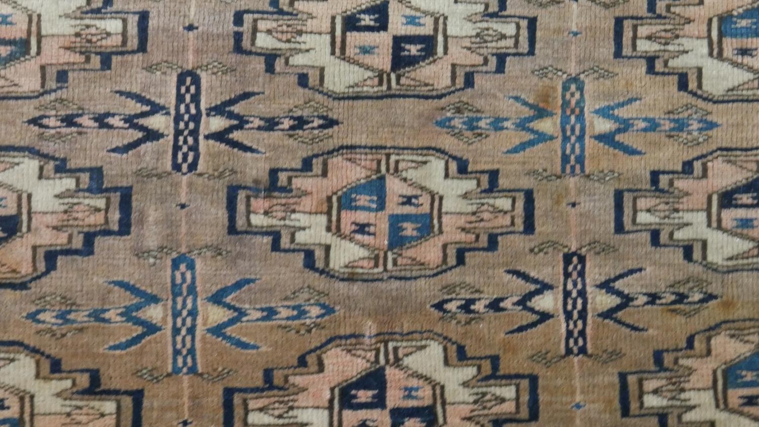 A tan ground fine handmade Turkman saddle bag. L.113 W.73cm - Image 3 of 7