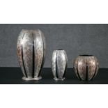 A collection of Art Deco Ikora silver plated pieces by WMF, three vases of various sizes with