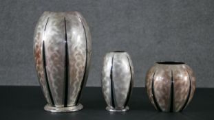 A collection of Art Deco Ikora silver plated pieces by WMF, three vases of various sizes with