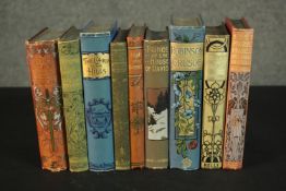 A collection of nine early 20th century hardback books with Art Nouveau design coloured and gilded