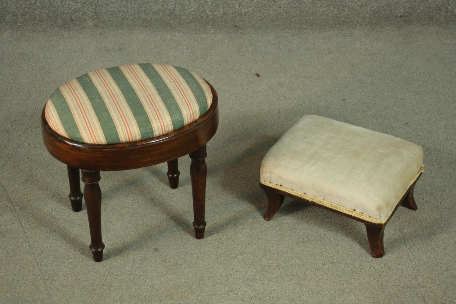 An oval footstool with striped fabric on turned legs, together with a cushion in matching fabric,