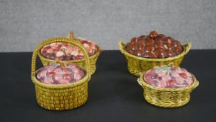 A collection of four early 20th century French Sarreguemines majolica ceramic fruit design lidded