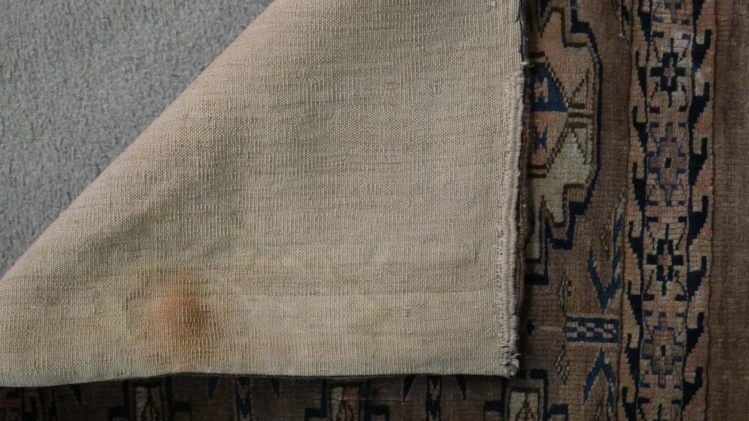 A tan ground fine handmade Turkman saddle bag. L.113 W.73cm - Image 7 of 7