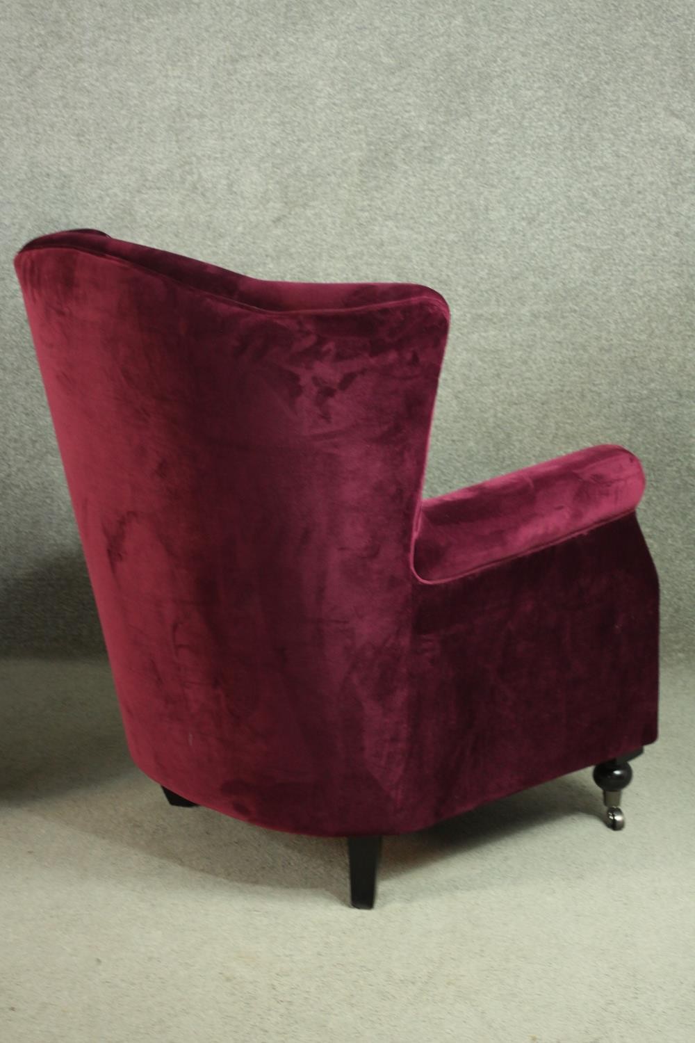 A pair of Victorian style wingback armchairs, upholstered in purple velour, with a buttoned back, - Image 9 of 9