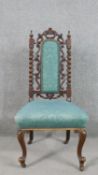 A Carolean style fruitwood side chair, the blue upholstered back with barley twist uprights, over an