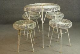 A white painted iron garden set, comprising a circular table and four stools. H.72 Dia.70cm (table)