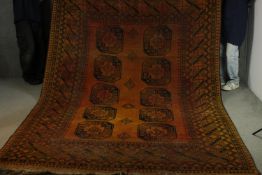 A gold ground wash Afghan hand made carpet. L.300 W.216cm.
