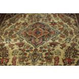 A Persian Hamadan cream ground hand made carpet. L.280 W.230cm.