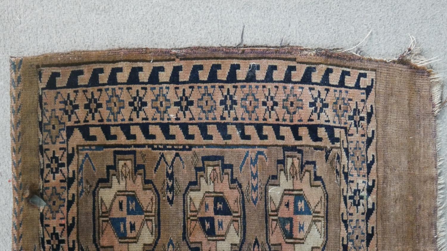 A tan ground fine handmade Turkman saddle bag. L.113 W.73cm - Image 5 of 7
