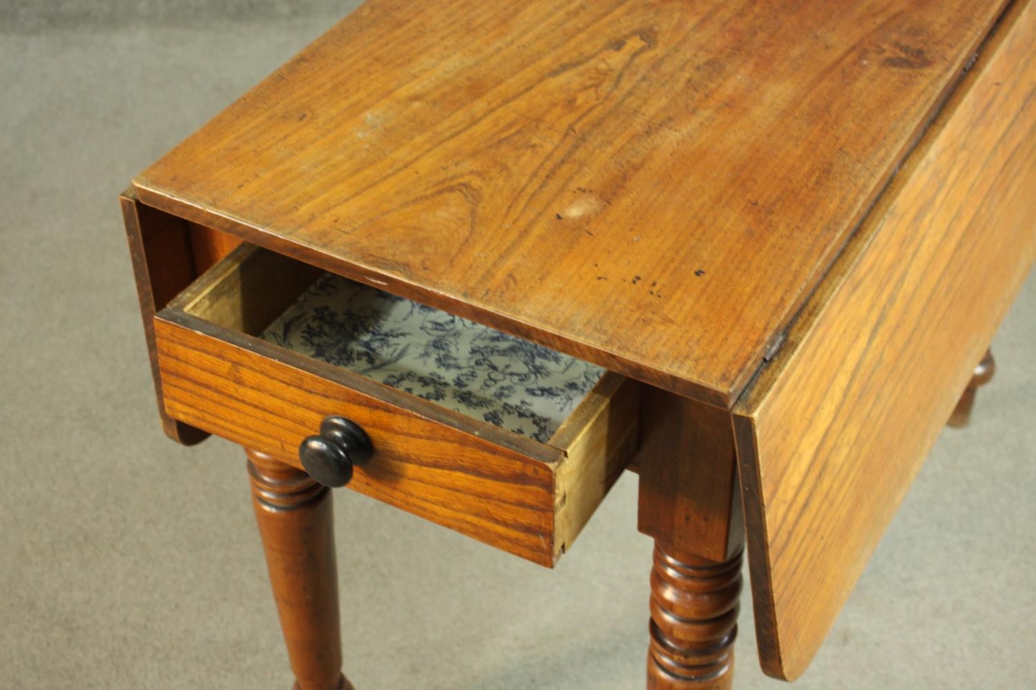 A Victorian Pembroke table, with drop leaves over an end drawer, on turned legs. H.70 W.44 D. - Image 5 of 7