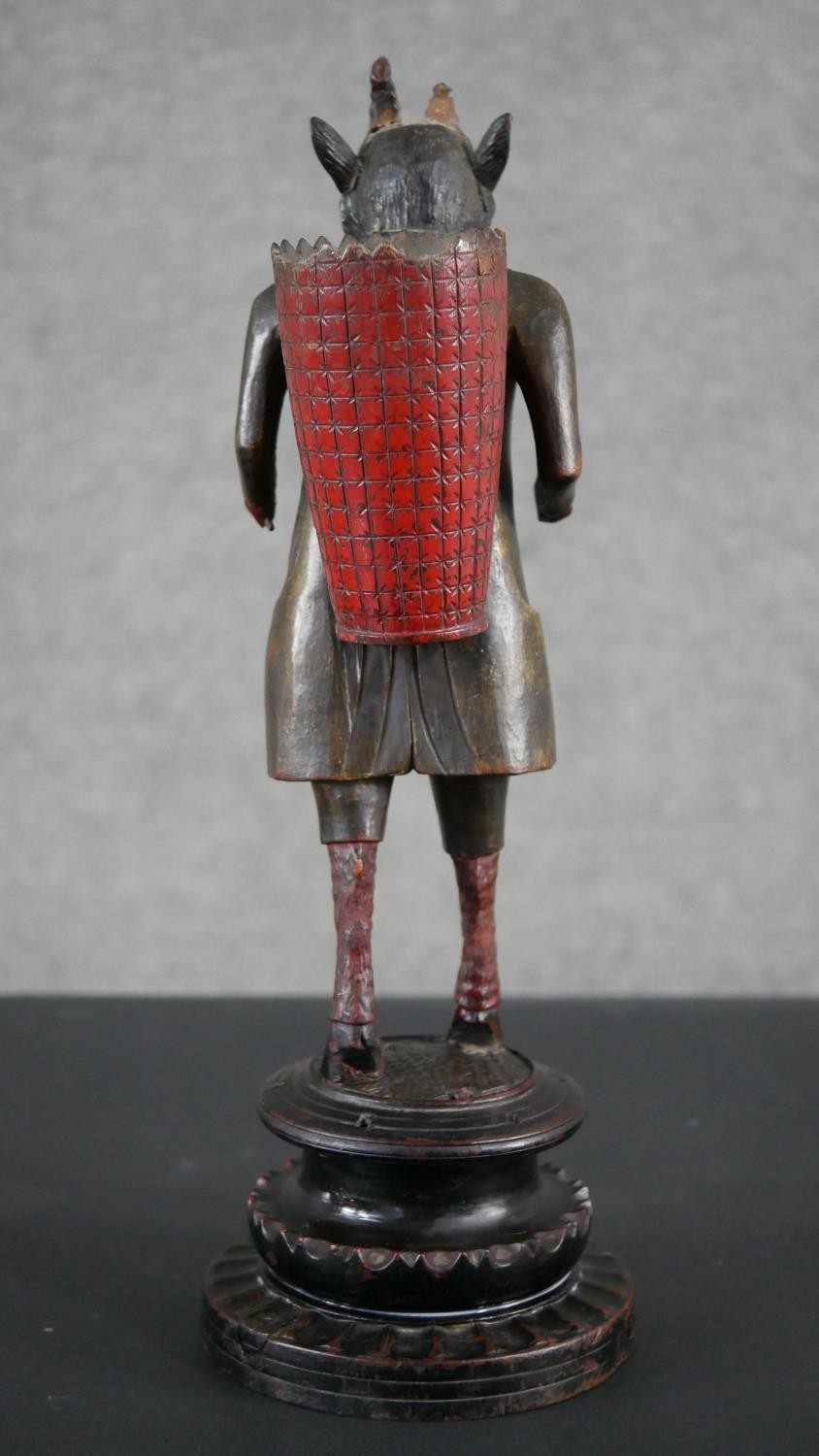 A 19th century carved black forest faun match holder, a pedestal base with red basket on his back. - Image 4 of 6